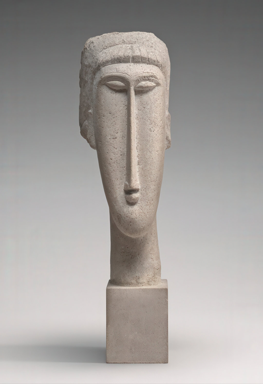 Modigliani stone head sculpture showing elongated facial structure